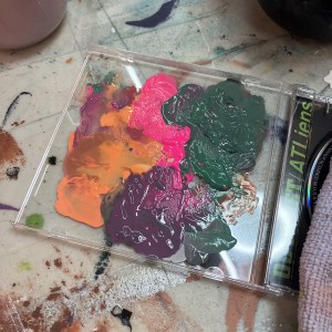 One of Alex Da Corte’s CD jewel case paint palettes, March 2025. Photo: Alex Da Corte.