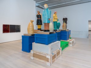 Thomas Schütte, Die Fremden (The Strangers), 1992, glazed ceramic, steel. Installation view, Museum of Modern Art, New York, 2024. Photo: Jonathan Dorado.