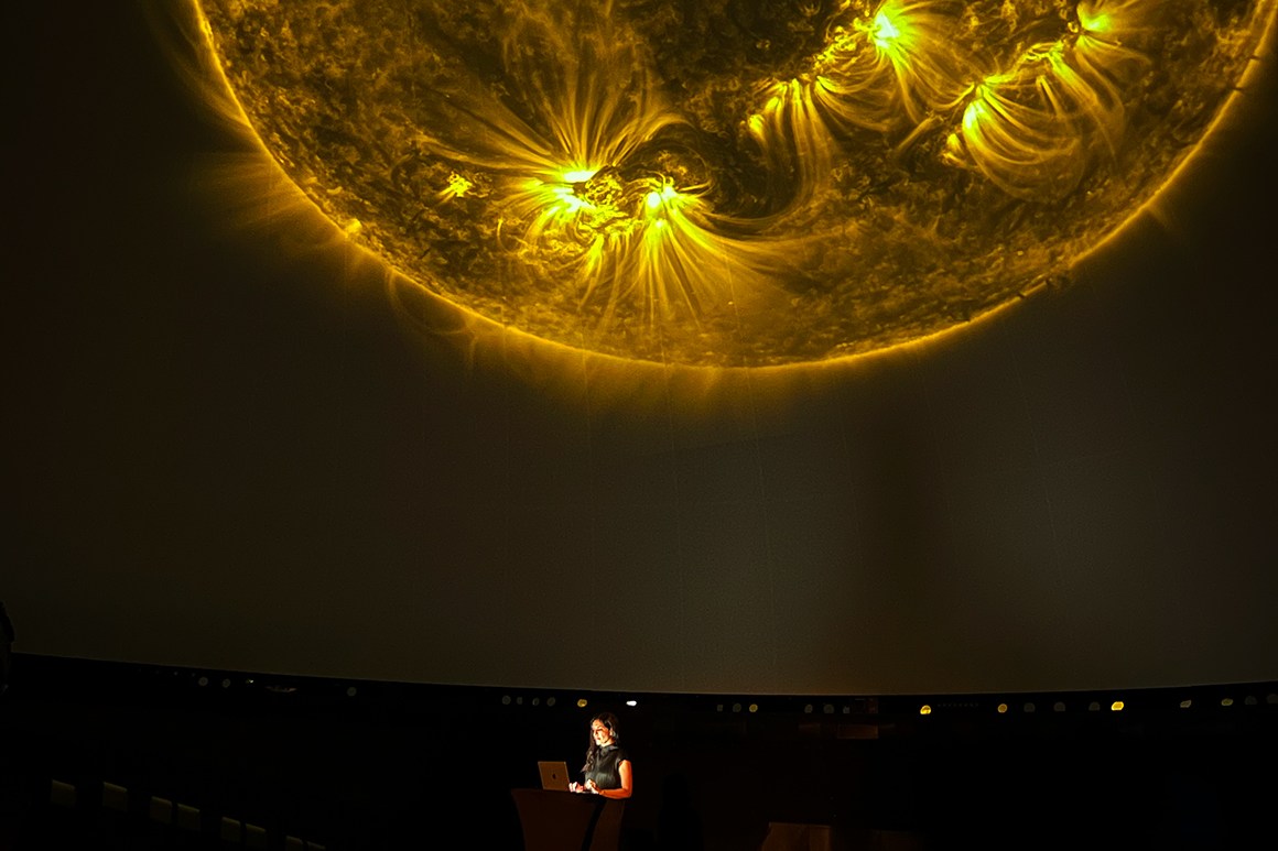 Ala Roushan presenting her “Solar Exchange” lecture performance, Hamburg Planetarium, Germany, June 20, 2024.