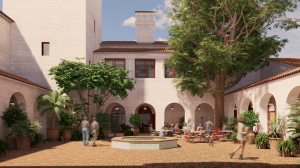 A sunny courtyard surrounded by light-colored buildings with red-tiled roofs and arched openings. The space is decorated with potted plants and trees, including a large central tree and a tiled fountain. People are walking and sitting at red tables, enjoying the calm atmosphere.